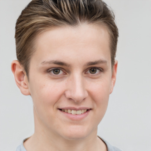 Joyful white young-adult female with short  brown hair and grey eyes