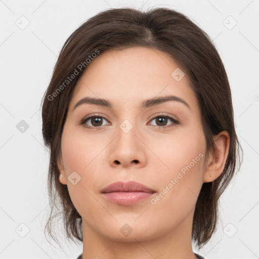 Neutral white young-adult female with medium  brown hair and brown eyes