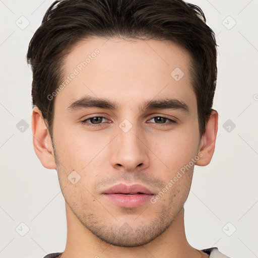 Neutral white young-adult male with short  brown hair and brown eyes