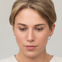 Neutral white young-adult female with short  brown hair and brown eyes