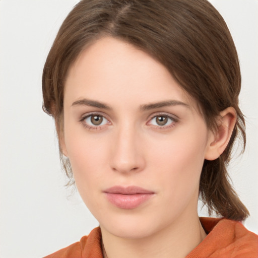 Neutral white young-adult female with medium  brown hair and brown eyes