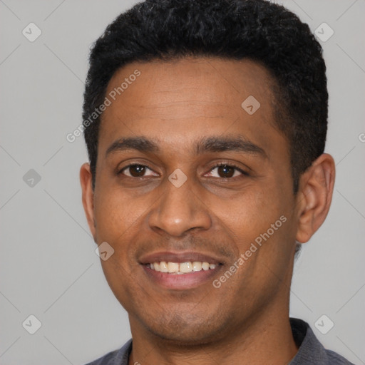 Joyful latino young-adult male with short  black hair and brown eyes
