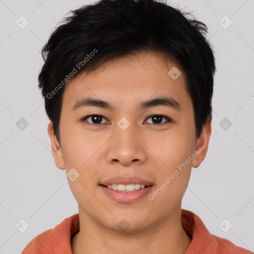 Joyful asian young-adult male with short  brown hair and brown eyes