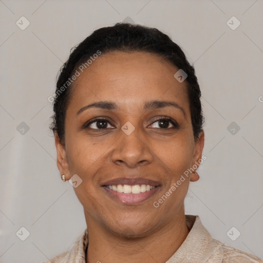 Joyful latino young-adult female with short  black hair and brown eyes