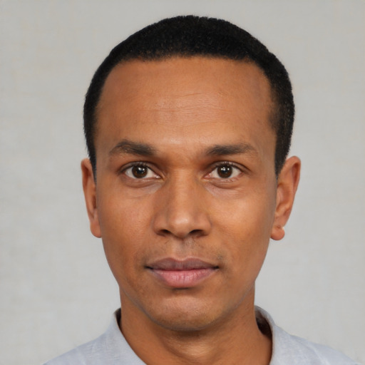 Neutral black young-adult male with short  black hair and brown eyes