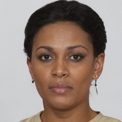 Neutral black young-adult female with short  brown hair and brown eyes