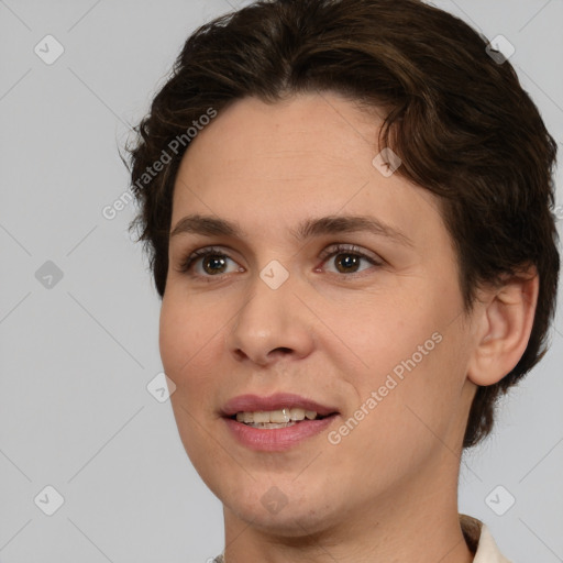 Joyful white young-adult female with short  brown hair and brown eyes