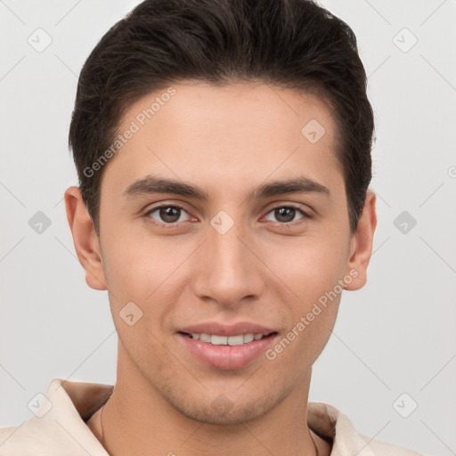 Joyful white young-adult male with short  brown hair and brown eyes