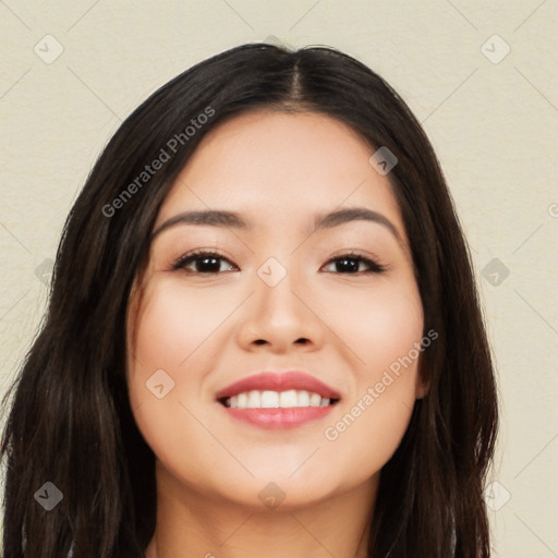 Joyful white young-adult female with long  black hair and brown eyes