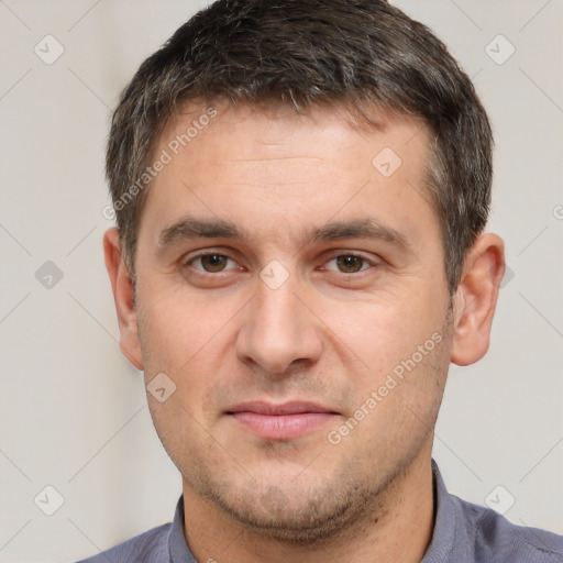 Neutral white young-adult male with short  brown hair and brown eyes