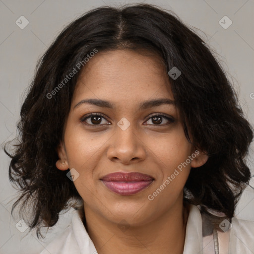 Joyful black young-adult female with medium  brown hair and brown eyes