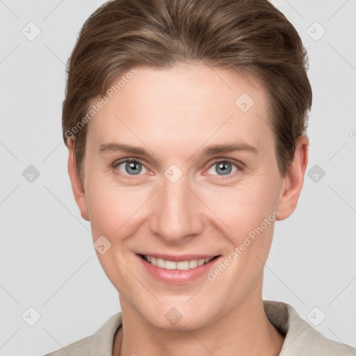 Joyful white young-adult female with short  brown hair and grey eyes