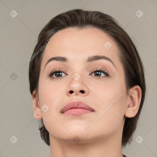 Neutral white young-adult female with medium  brown hair and brown eyes