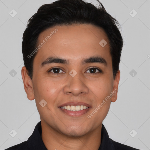 Joyful white young-adult male with short  black hair and brown eyes
