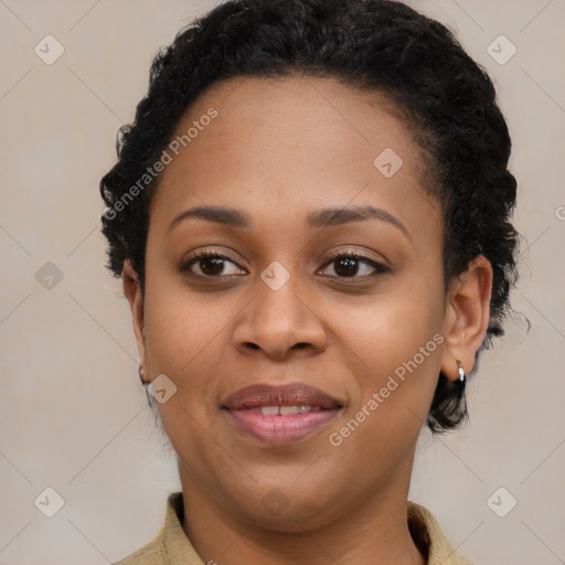 Joyful black young-adult female with medium  brown hair and brown eyes