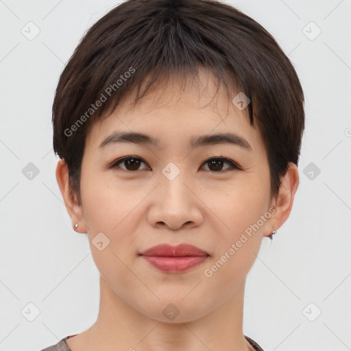 Joyful asian young-adult female with short  brown hair and brown eyes