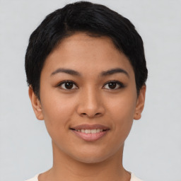 Joyful asian young-adult female with short  black hair and brown eyes