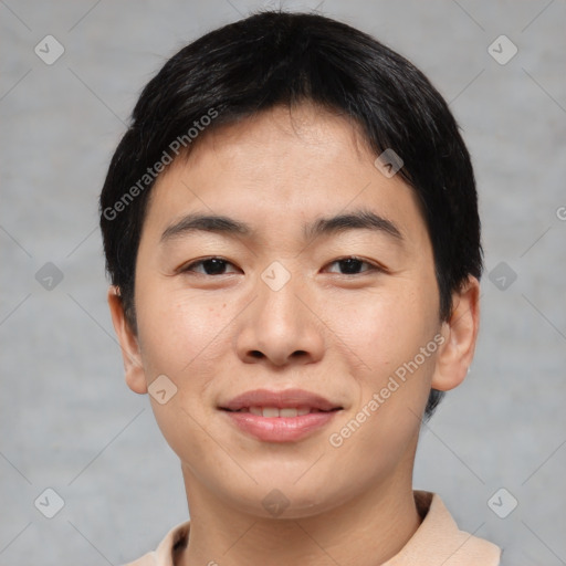 Joyful asian young-adult male with short  brown hair and brown eyes