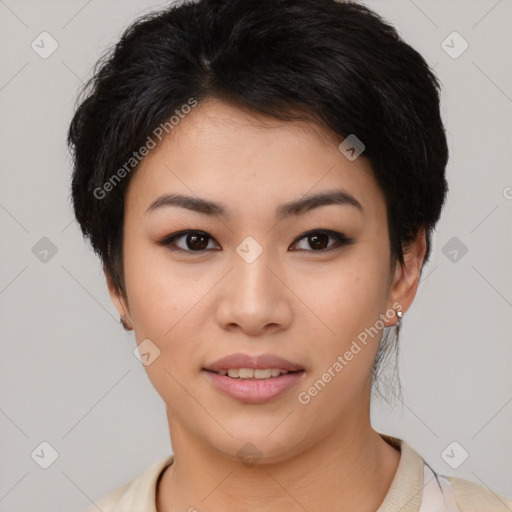 Joyful asian young-adult female with short  black hair and brown eyes