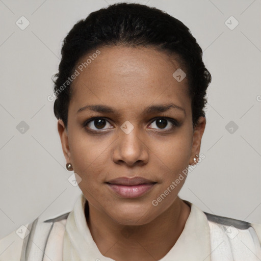 Joyful latino young-adult female with short  brown hair and brown eyes