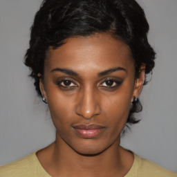 Neutral black young-adult female with short  black hair and brown eyes