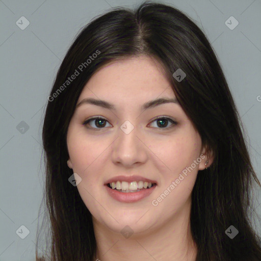 Joyful latino young-adult female with long  brown hair and brown eyes