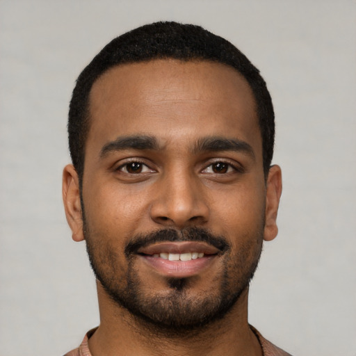 Neutral black young-adult male with short  black hair and brown eyes