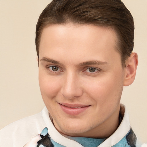 Joyful white young-adult male with short  brown hair and brown eyes