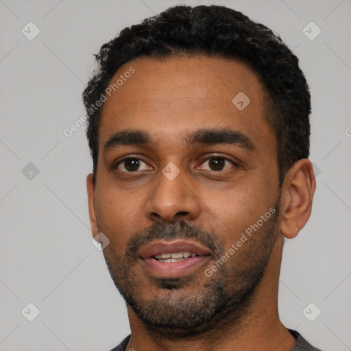 Neutral black young-adult male with short  black hair and brown eyes