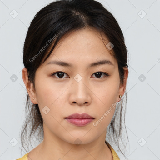 Neutral asian young-adult female with medium  brown hair and brown eyes