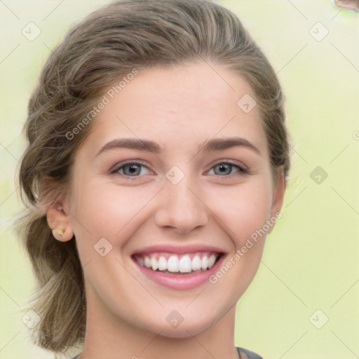 Joyful white young-adult female with medium  brown hair and green eyes