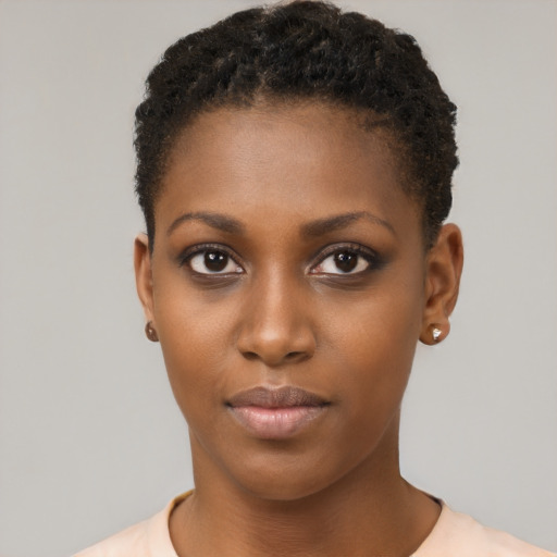 Neutral black young-adult female with short  brown hair and brown eyes