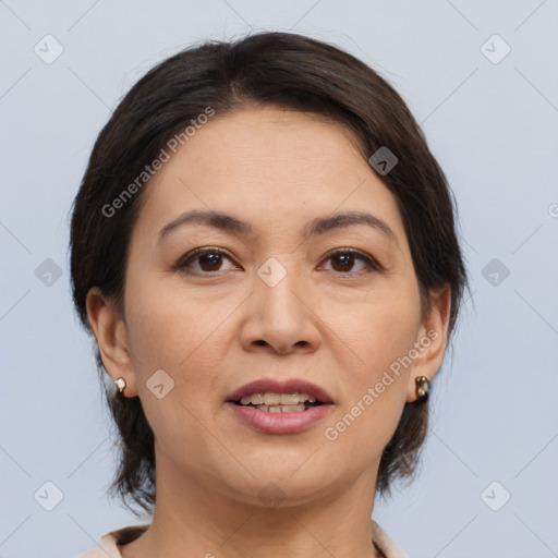 Joyful white adult female with medium  brown hair and brown eyes