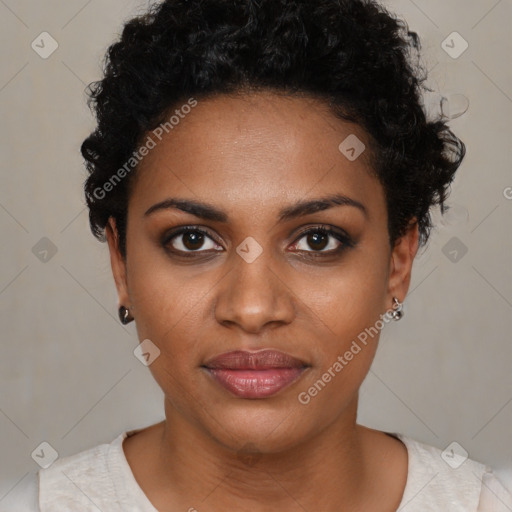 Joyful black young-adult female with short  black hair and brown eyes