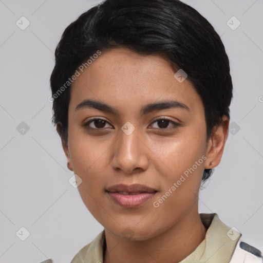 Joyful asian young-adult female with short  black hair and brown eyes