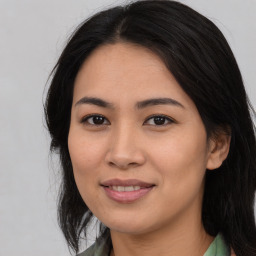 Joyful asian young-adult female with medium  brown hair and brown eyes