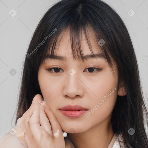 Neutral asian young-adult female with long  brown hair and brown eyes