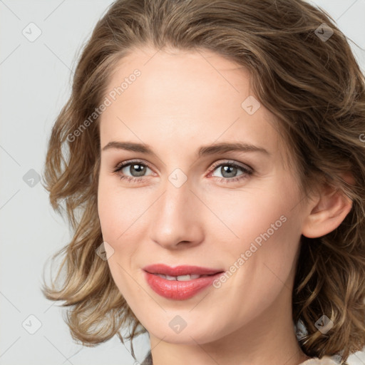 Joyful white young-adult female with medium  brown hair and green eyes