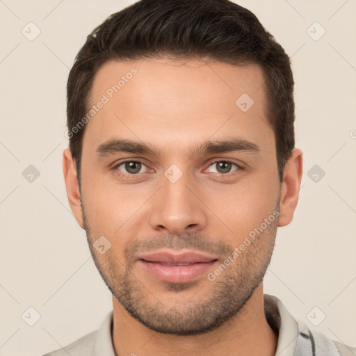 Joyful white young-adult male with short  brown hair and brown eyes