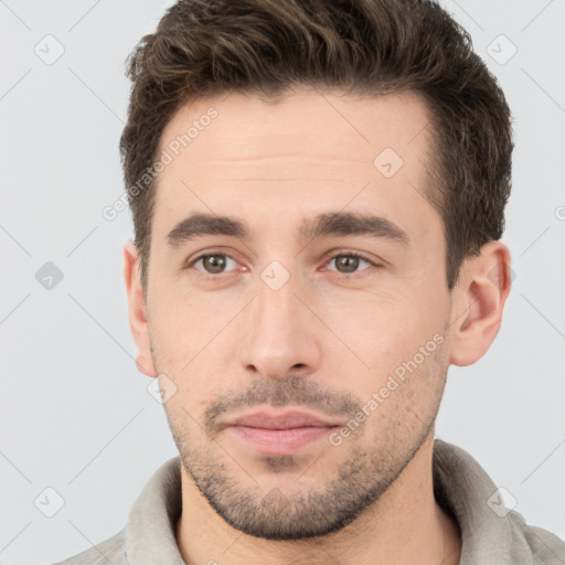 Neutral white young-adult male with short  brown hair and brown eyes