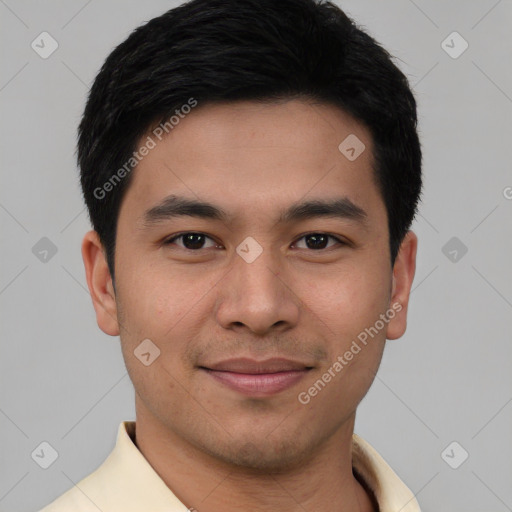 Joyful white young-adult male with short  black hair and brown eyes