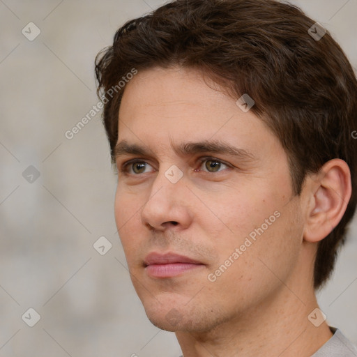 Neutral white young-adult male with short  brown hair and brown eyes