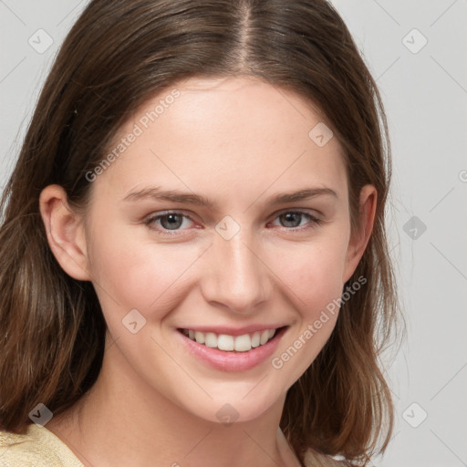 Joyful white young-adult female with medium  brown hair and blue eyes