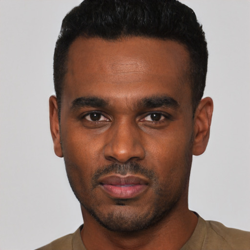 Neutral black young-adult male with short  black hair and brown eyes
