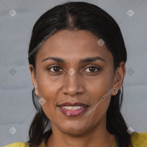 Joyful black young-adult female with medium  brown hair and brown eyes