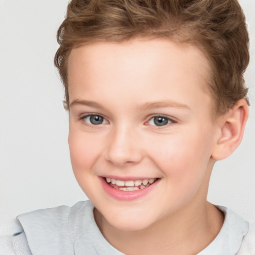 Joyful white child female with short  brown hair and brown eyes