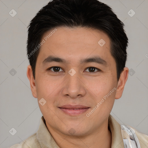 Joyful asian young-adult male with short  brown hair and brown eyes