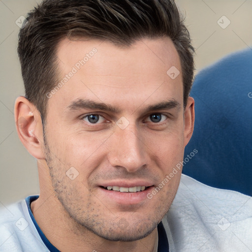 Joyful white adult male with short  brown hair and brown eyes