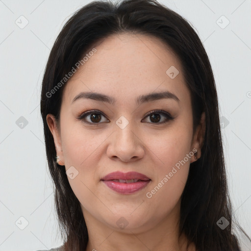 Joyful latino young-adult female with medium  brown hair and brown eyes