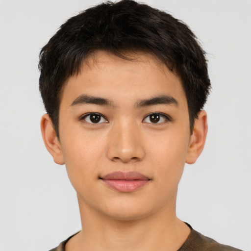Joyful latino young-adult male with short  brown hair and brown eyes